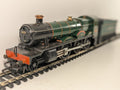 Hornby OO Gauge GWR 4-6-0 Hall Class Guild Hall locomotive 5927 in green livery on model tracks