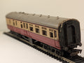 Tri-ang OO Gauge BR Crimson and Cream composite passenger coach on model railway track
