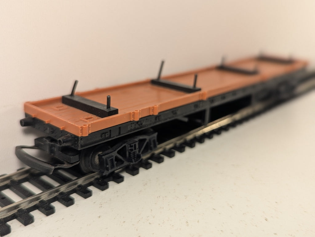 Tri-ang OO Gauge Bogie Bolster Wagon Goods Wagon Unlettered Brown and Black