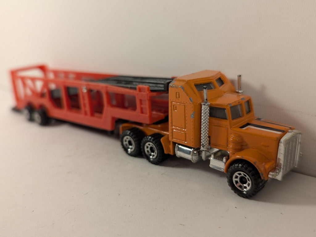 Matchbox 1:100 Kenworth Aerodyne Car Transporter Die-cast Truck Orange and Red