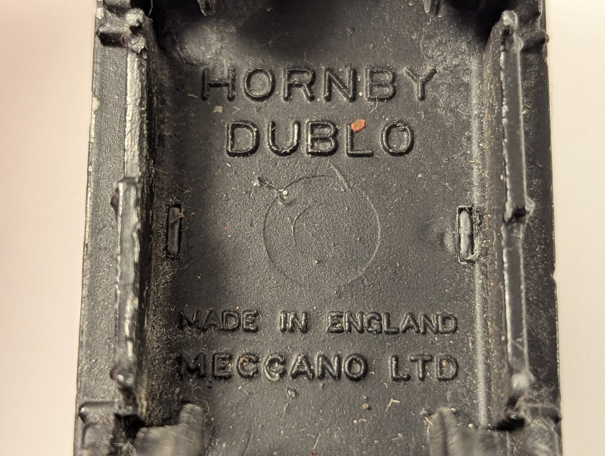 Underside of Hornby Dublo Esso petrol tank wagon showing embossed text Hornby Dublo Made in England Meccano Ltd