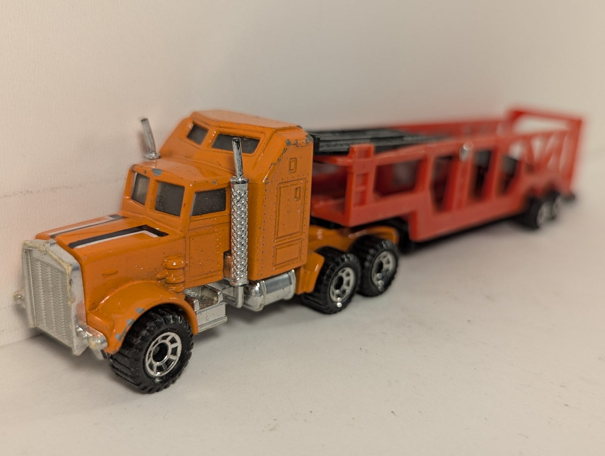Matchbox 1:100 Kenworth Aerodyne Car Transporter Die-cast Truck Orange and Red