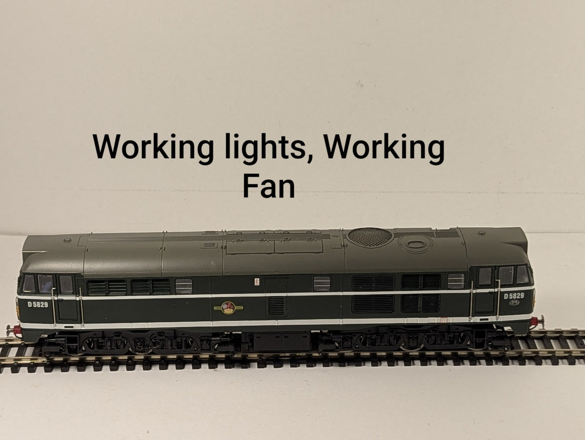 Hornby R3144A Class 31 D5829 in BR green with small yellow panel .
