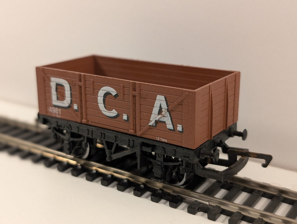 Hornby R036 7-Plank Open Wagon – “D.C.A. 4981” – OO Gauge