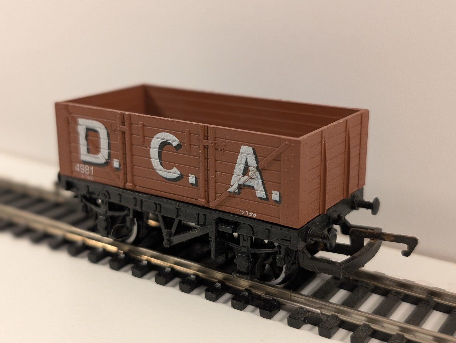 Hornby R036 7-Plank Open Wagon – “D.C.A. 4981” – OO Gauge