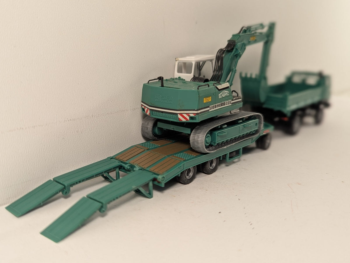 Roco 1516 Steyr 91 Tipper 922 Excavator finished in Schwarz Bau AG livery