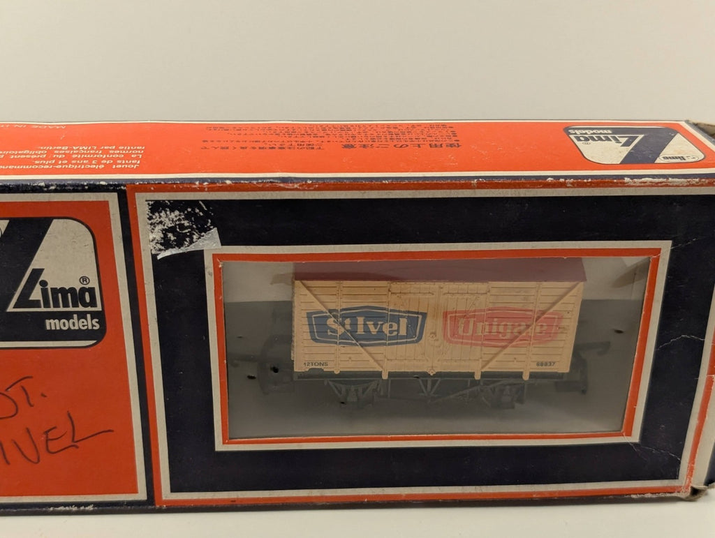 Lima 305604 OO Gauge St Ivel Unigate 20t Corrugated End Van
