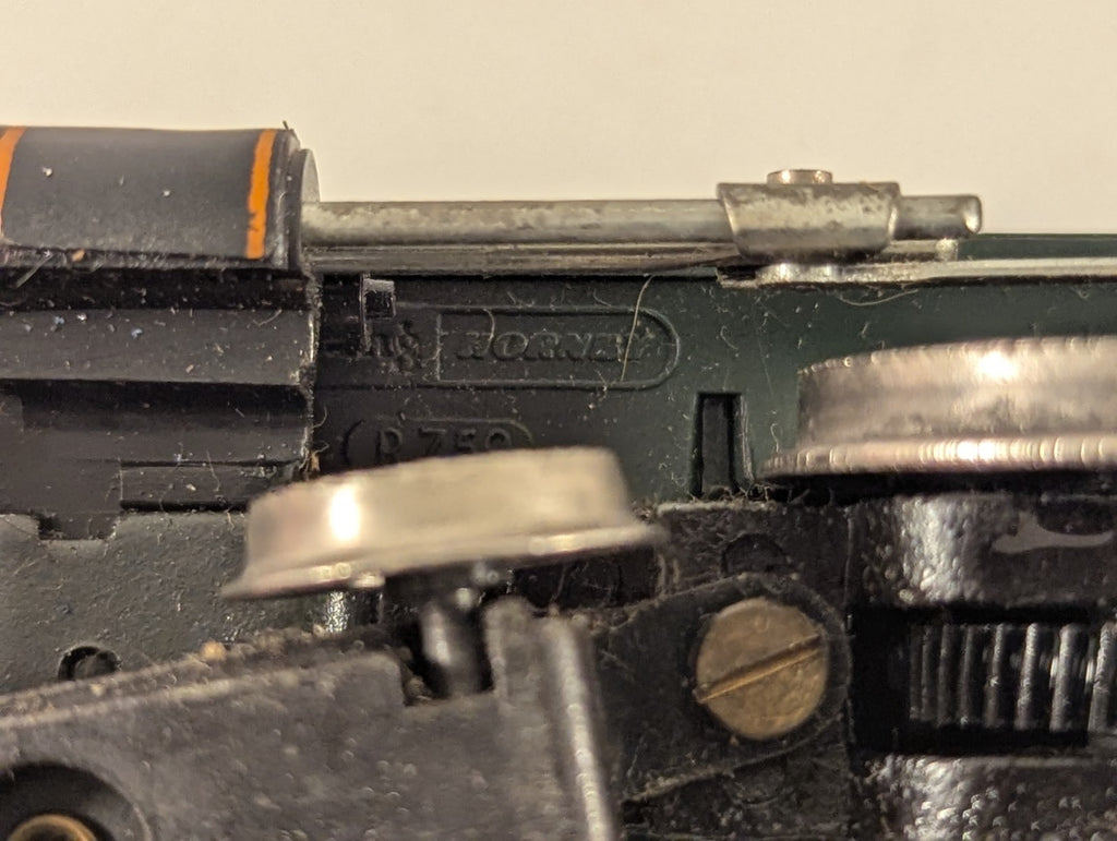 Close up of Hornby OO Gauge Class 4900 Albert Hall steam locomotive chassis showing branding and model details