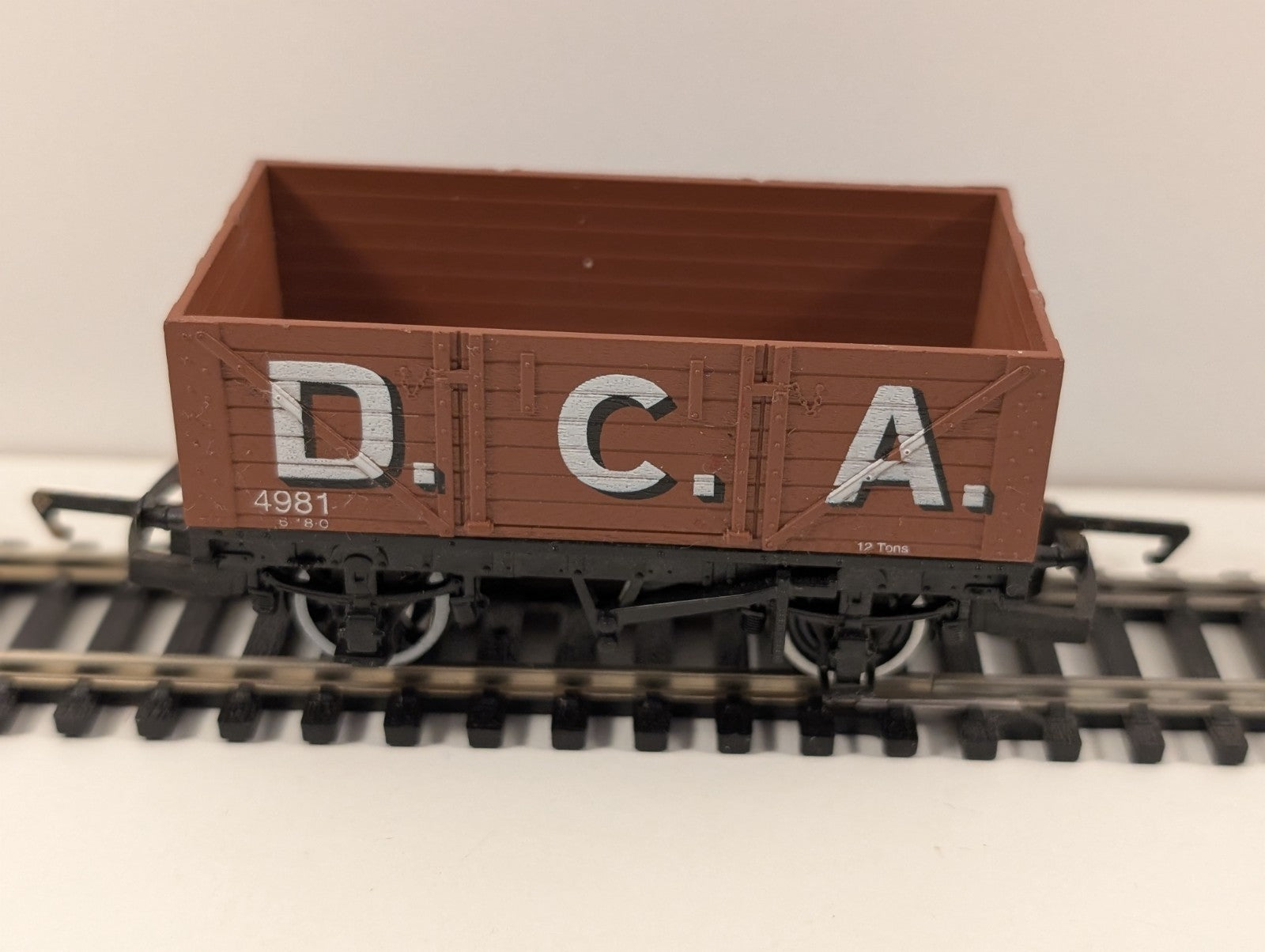 Hornby R036 7-Plank Open Wagon – “D.C.A. 4981” – OO Gauge