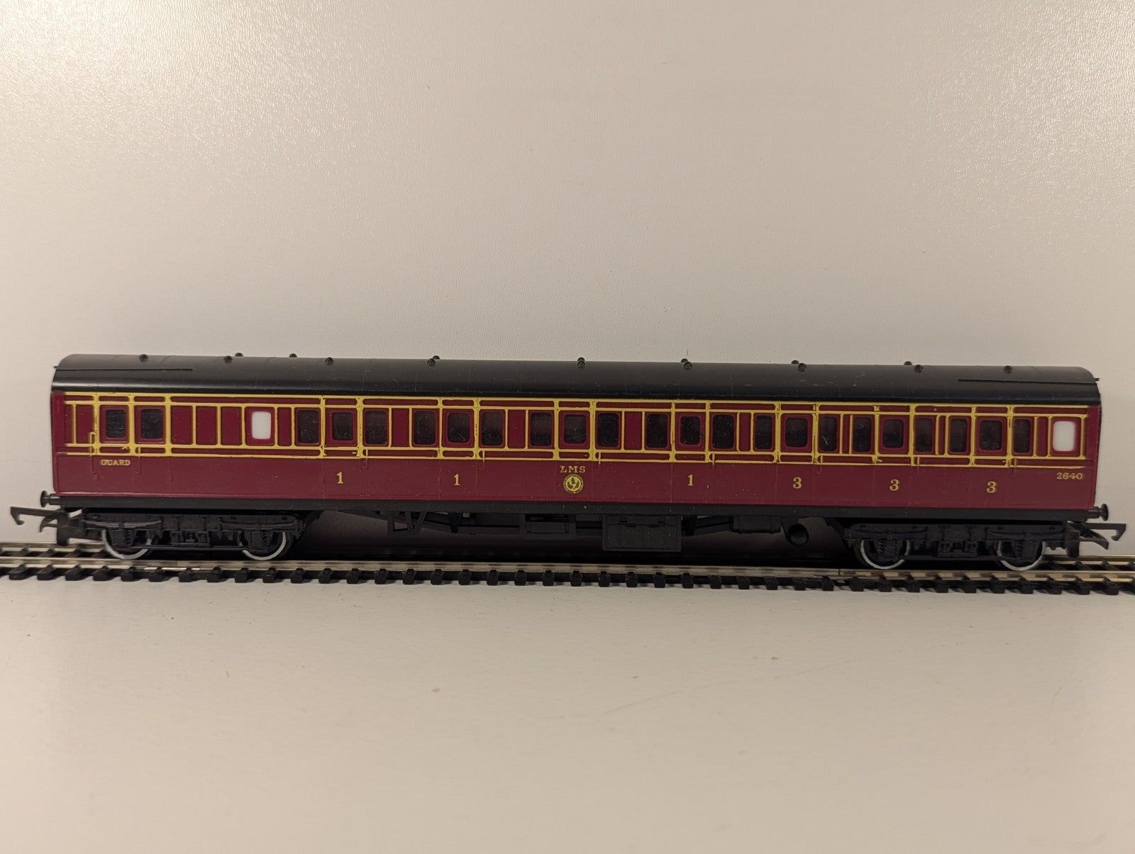 Hornby R748 OO Gauge LMS Caledonian Brake Coach Maroon
