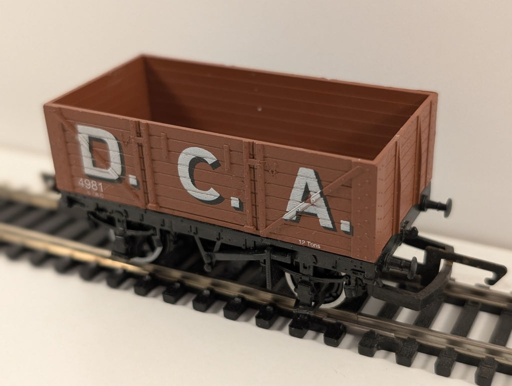 Hornby R036 7-Plank Open Wagon – “D.C.A. 4981” – OO Gauge