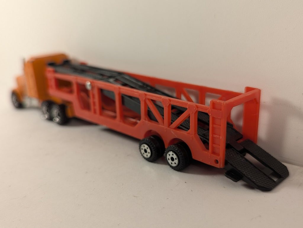 Matchbox 1:100 Kenworth Aerodyne Car Transporter Die-cast Truck Orange and Red