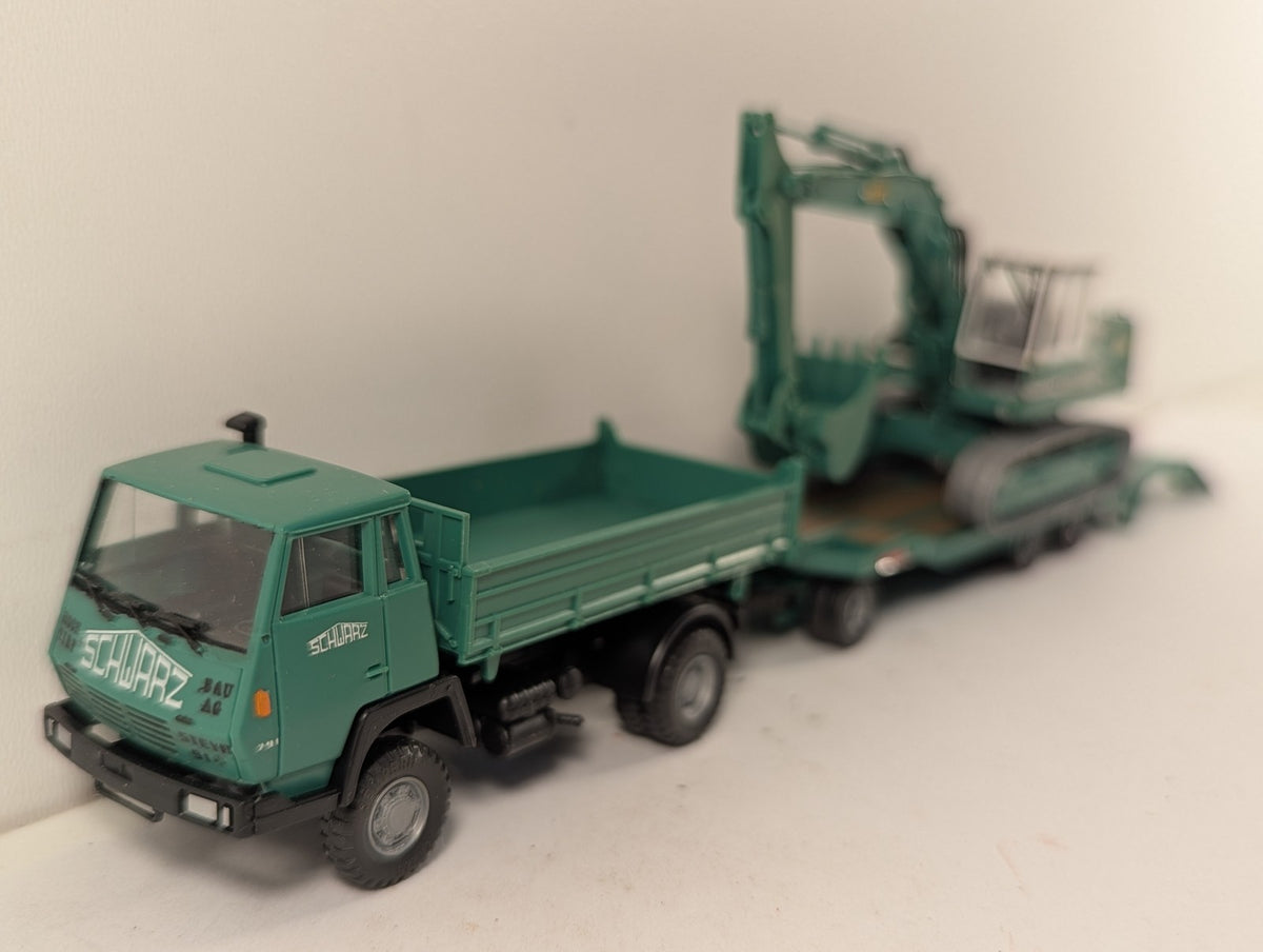 Roco 1516 Steyr 91 Tipper 922 Excavator finished in Schwarz Bau AG livery