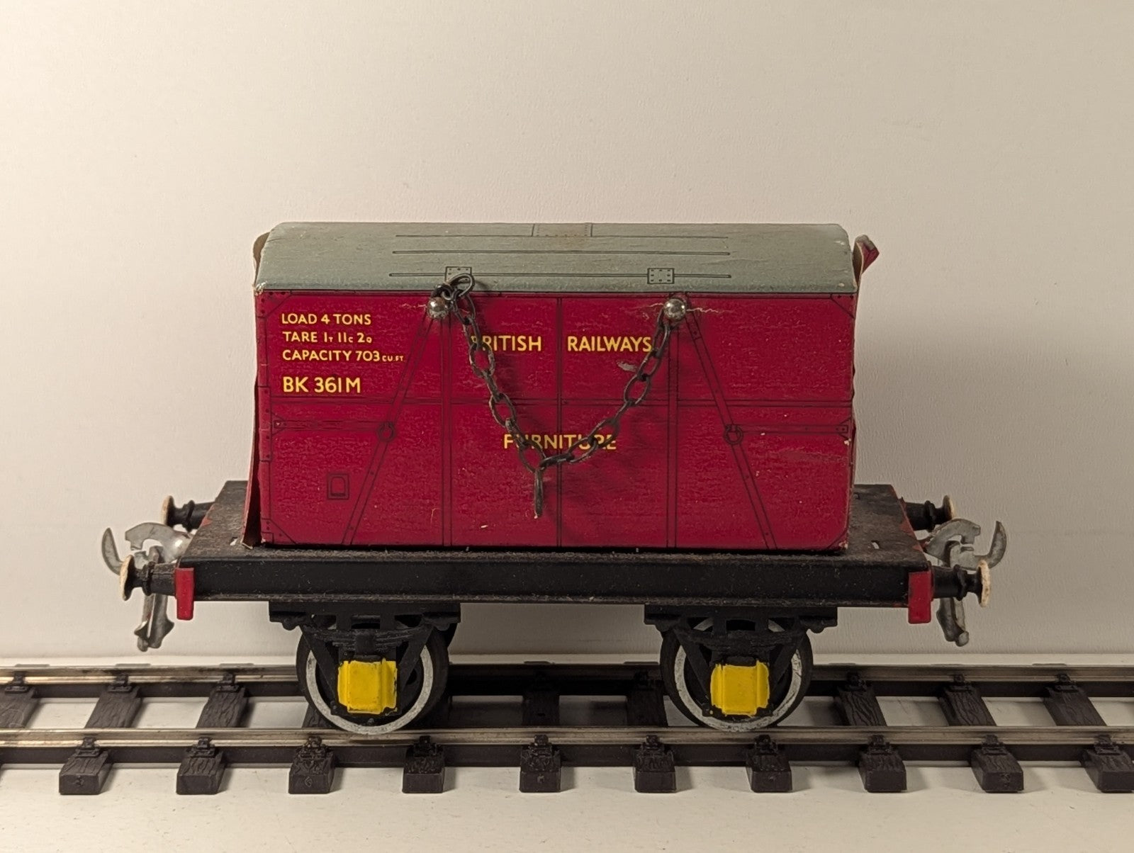 Hornby O Gauge Tinplate Flat Wagon with BR Furniture Container