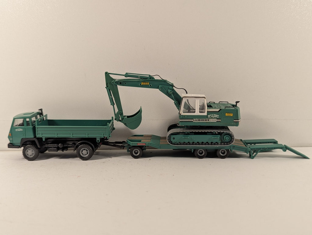 Roco 1516 Steyr 91 Tipper 922 Excavator finished in Schwarz Bau AG livery