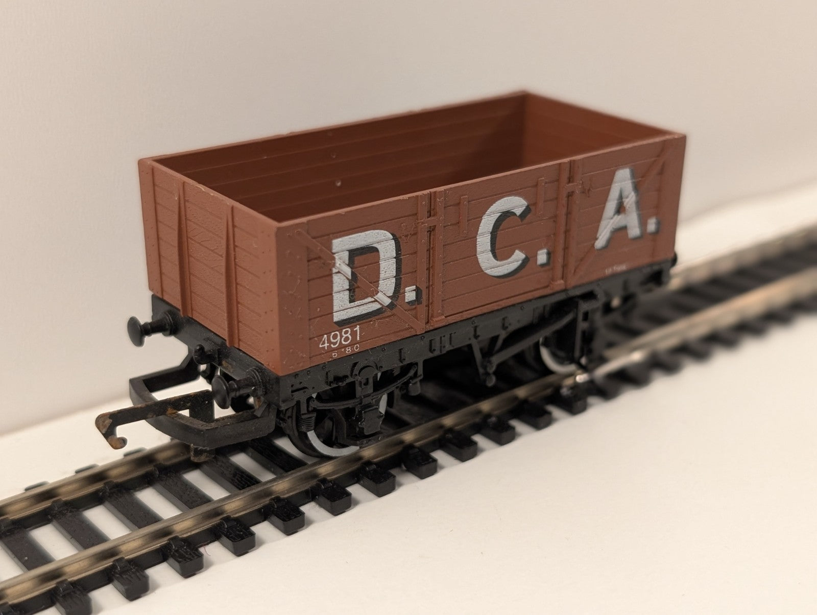 Hornby R036 7-Plank Open Wagon – “D.C.A. 4981” – OO Gauge