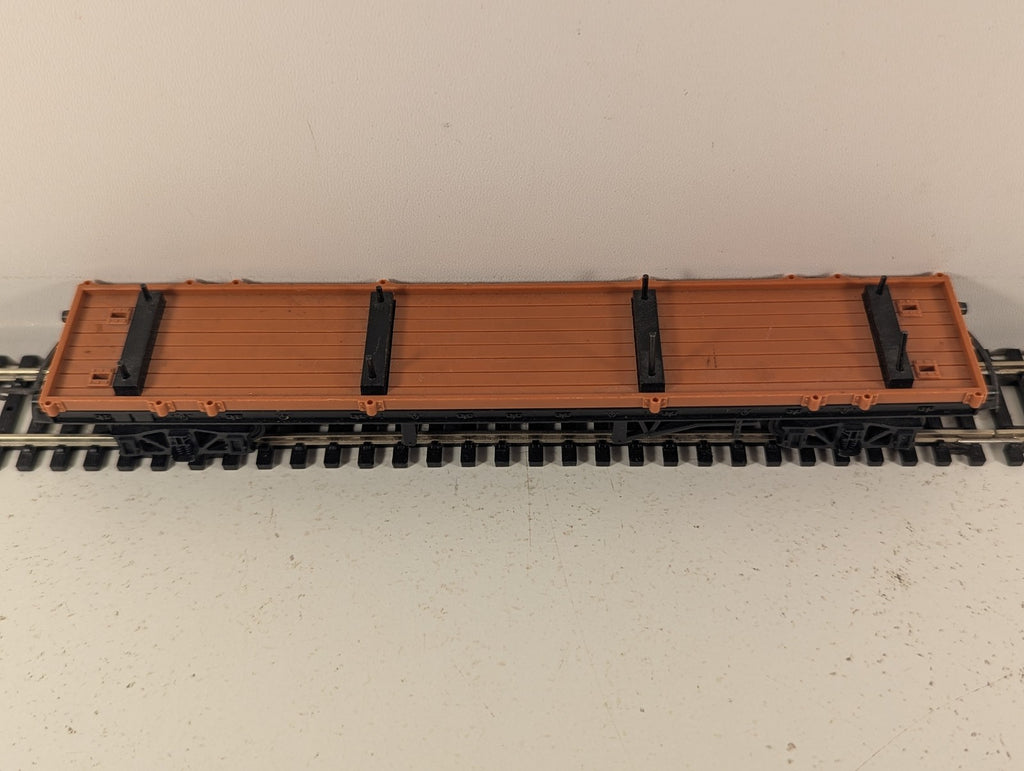 Tri-ang OO Gauge Bogie Bolster Wagon Goods Wagon Unlettered Brown and Black