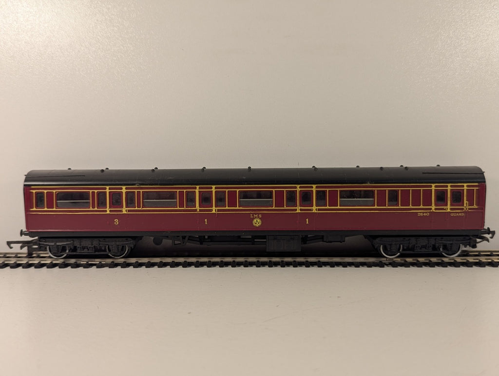 Hornby R748 OO Gauge LMS Caledonian Brake Coach Maroon