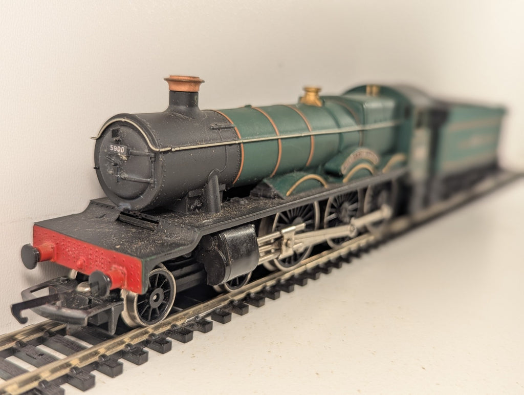 Hornby OO Gauge GWR Modified Hall Class Hinderton Hall locomotive on tracks