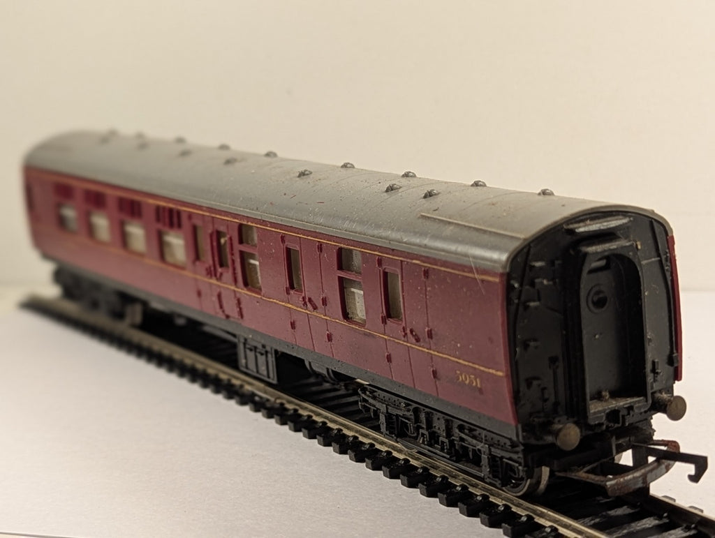 Hornby OO Gauge LMS Brake Third Coach 5051 in crimson livery on model railway track