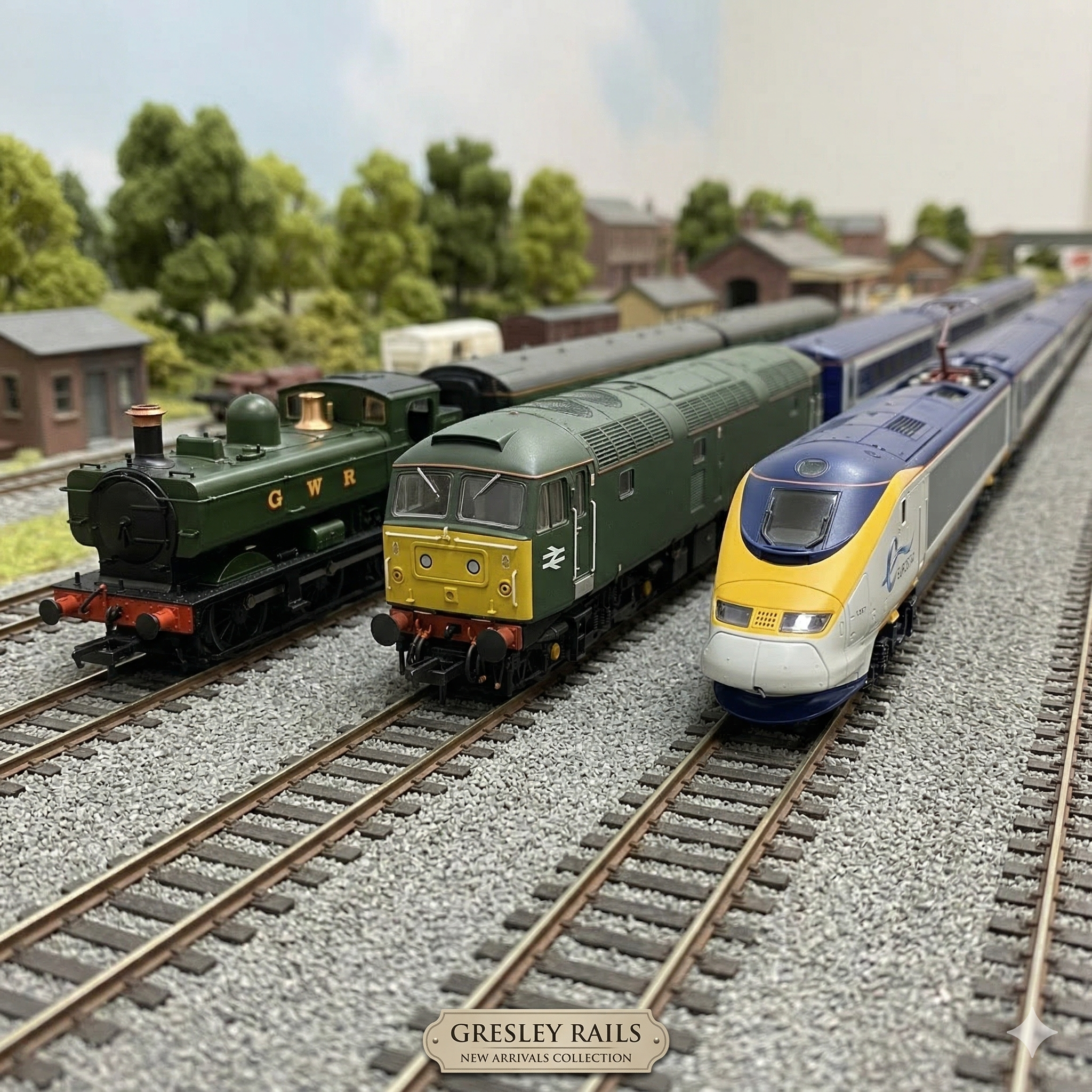 Three model trains on tracks: a green GWR steam train, a green and yellow diesel train, and a blue and yellow Eurostar