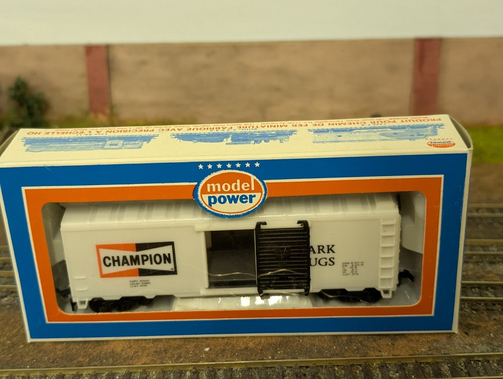 HO Scale Model Power, 40' Box Car, Champion Spark Plugs, White